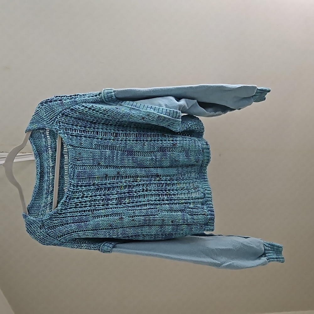 NWT Free people beautiful summer sweater belly shows off the shoulder.